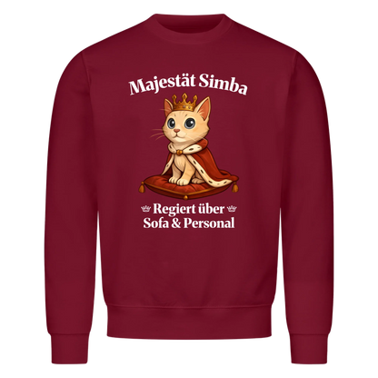 Majestät über Sofa und Personal